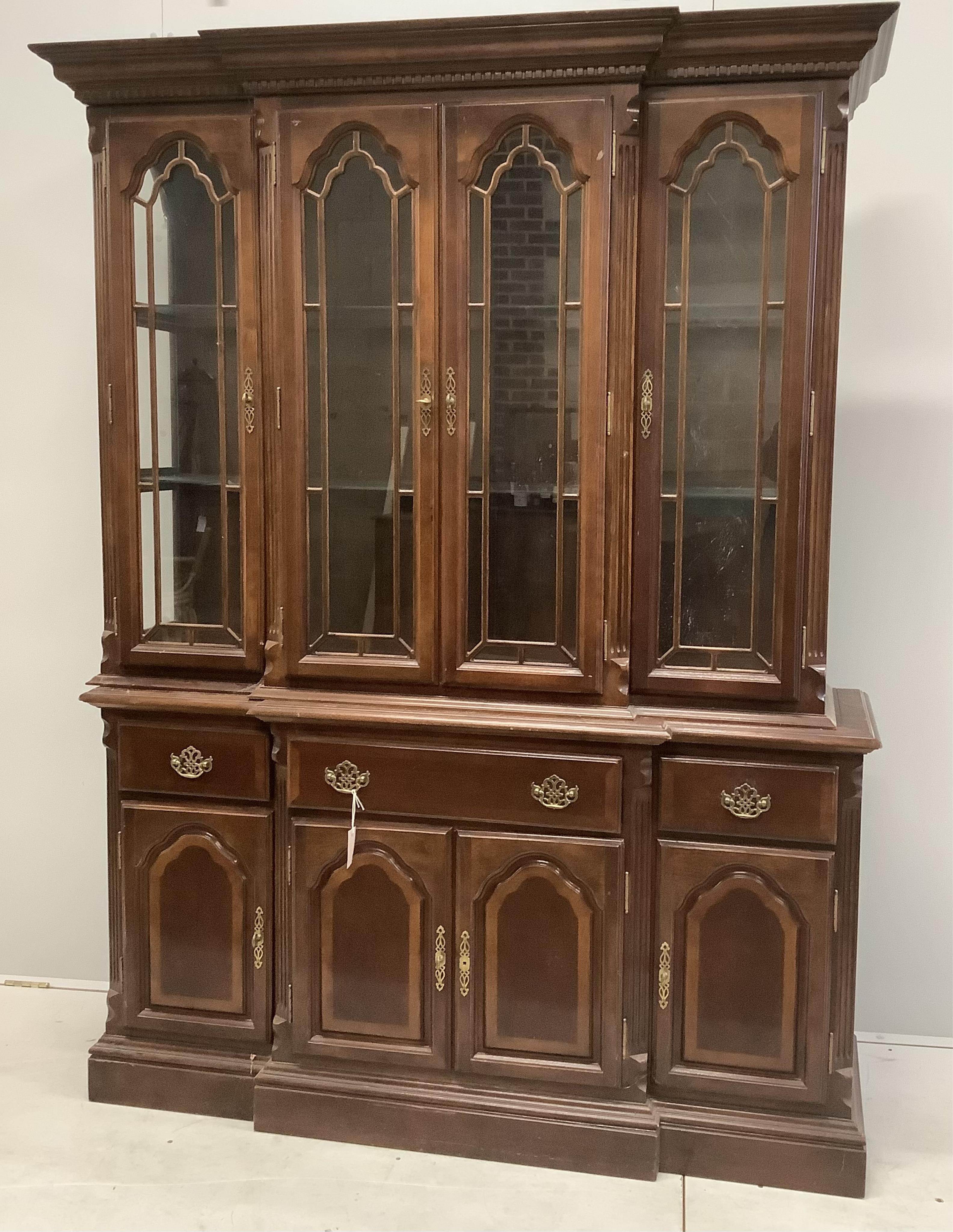 A Victorian style mahogany break front display cabinet, width 151cm, depth 43cm, height 202cm. Condition - poor to fair